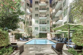 Courtyard with pool at night